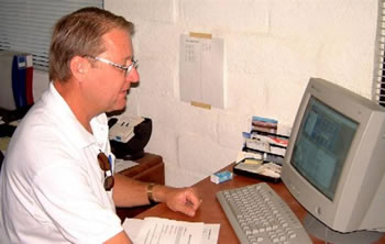 John working the rental desk