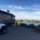 Motorhome and Jeep parked along the Colorado River